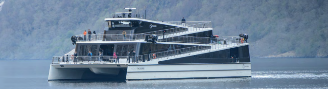 Large sightseeing cruise vessel approaching port. Large sightseeing cruise vessel approaching port.